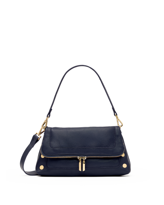A navy blue leather shoulder bag with gold-tone hardware, featuring a front flap pocket, a top zip closure, and a detachable shoulder strap, shown against a plain white background.