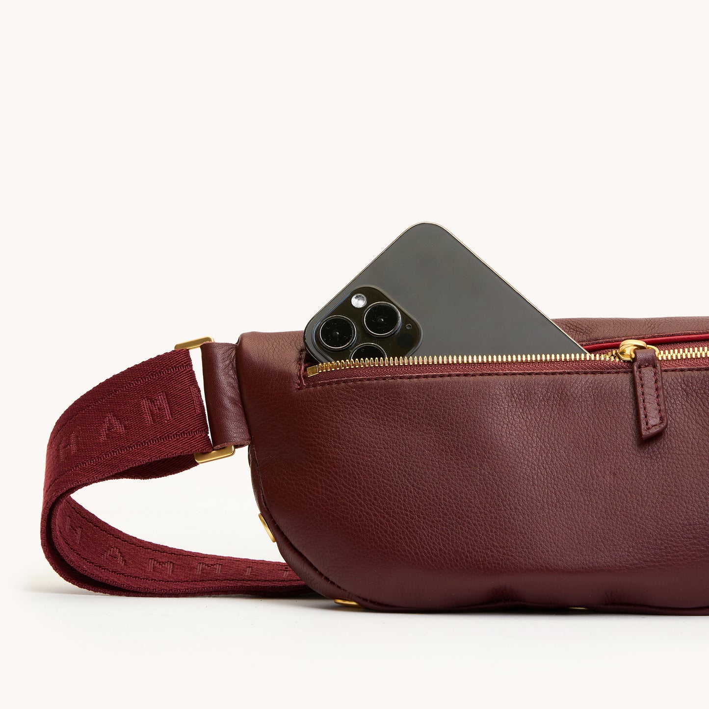 Charles-Crossbody-Med-Cherrywood-Pebble-BG-Front-Detail-View