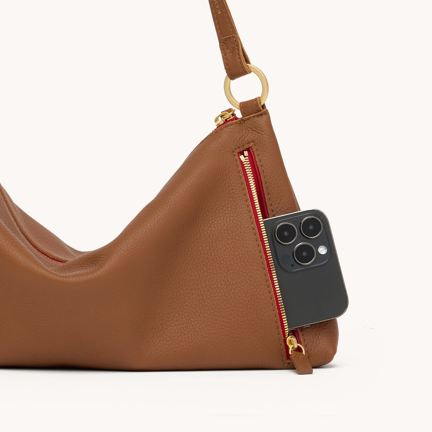 Kyle-Med-Mahogany-Pebble-BG-Red-Zip-Back-Detail