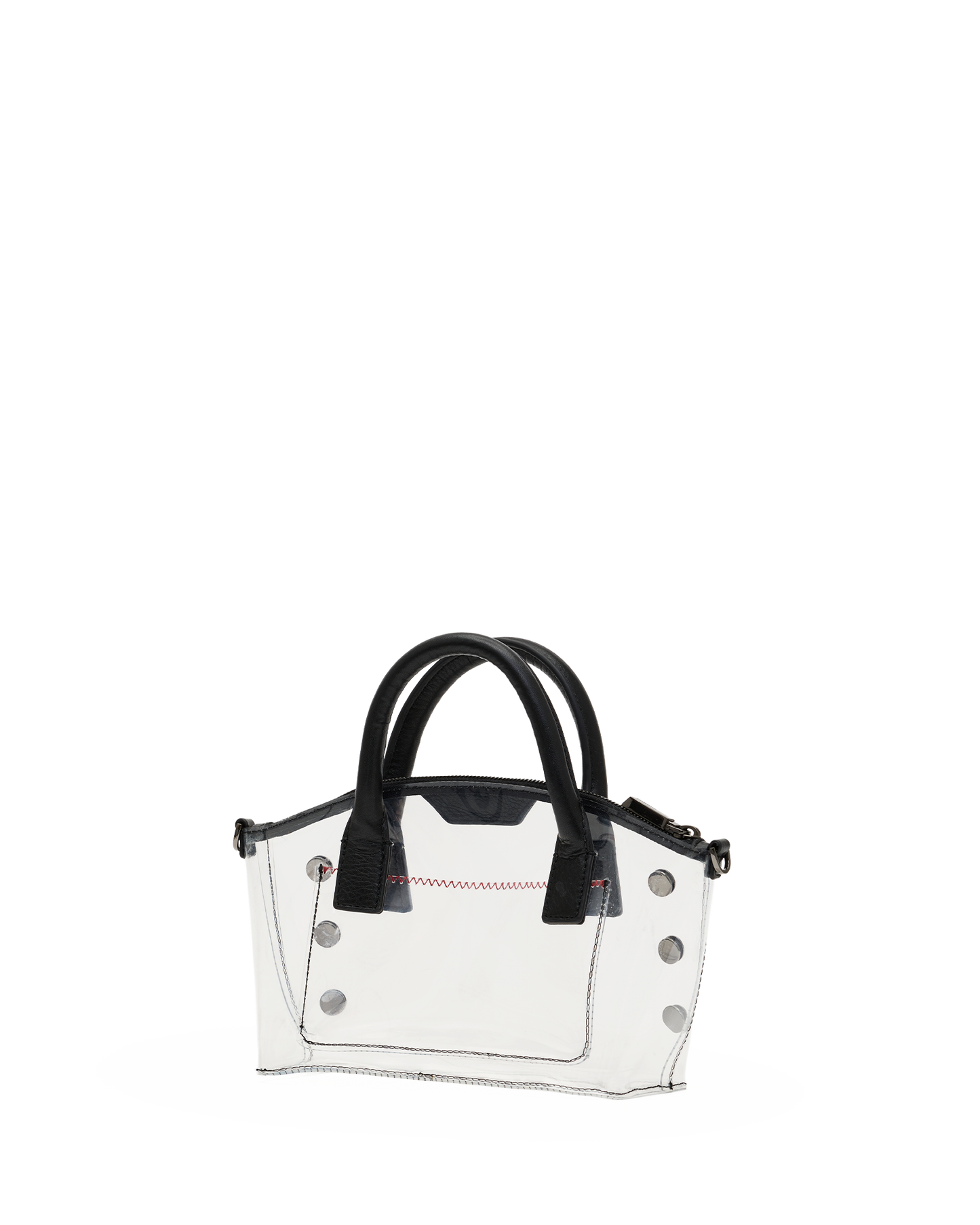 A clear transparent tote bag with black double top handles, black trim, and silver-tone metal studs, shown against a plain white background.