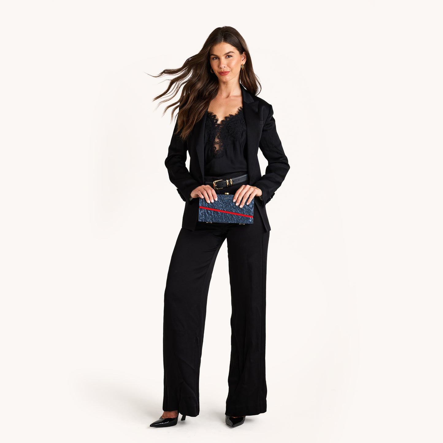 Model height is 5'9.5''