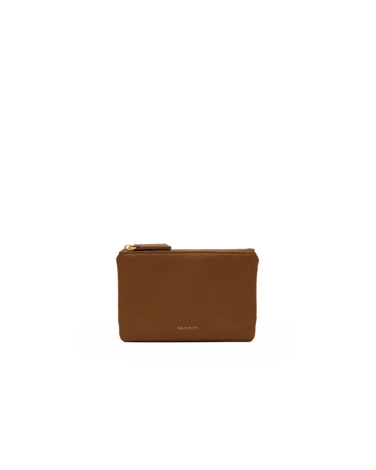 A small brown leather zip pouch with gold-tone hardware and a debossed MARCI logo on the front, centered against a plain white background.