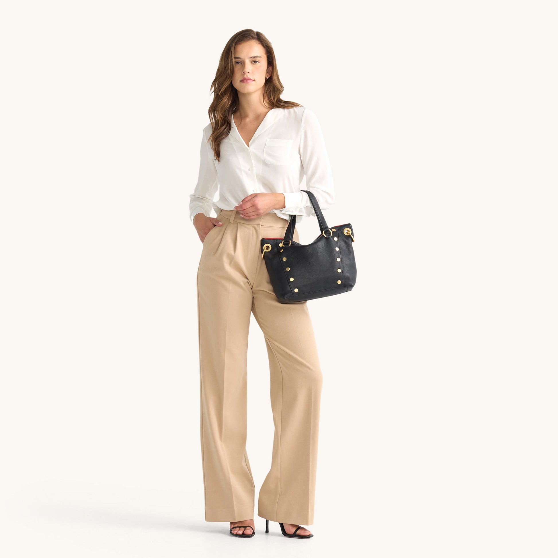 Model height is 5'8.5''