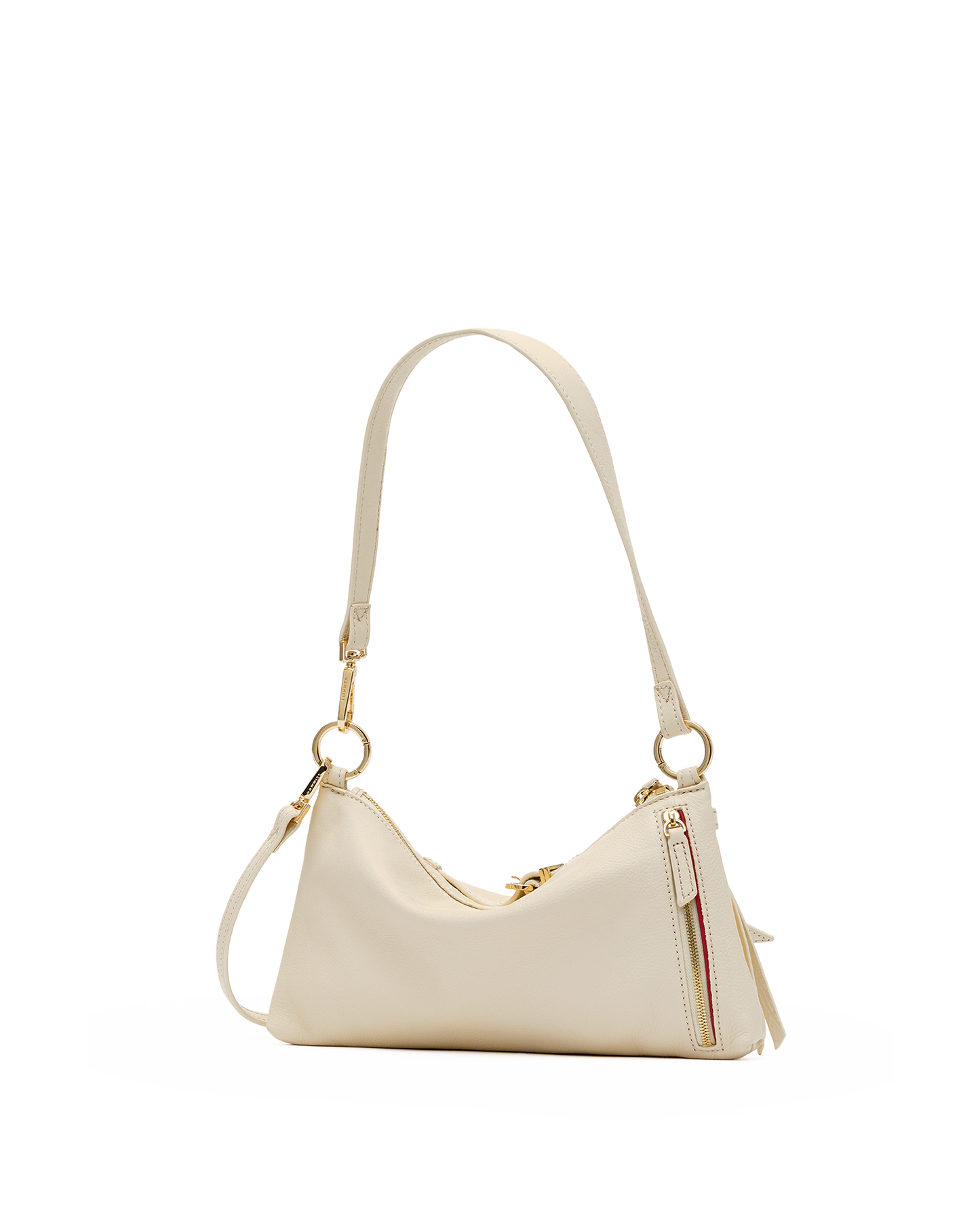 A light beige leather shoulder bag with a curved top, gold-tone hardware, and a matching shoulder strap, shown against a plain white background.