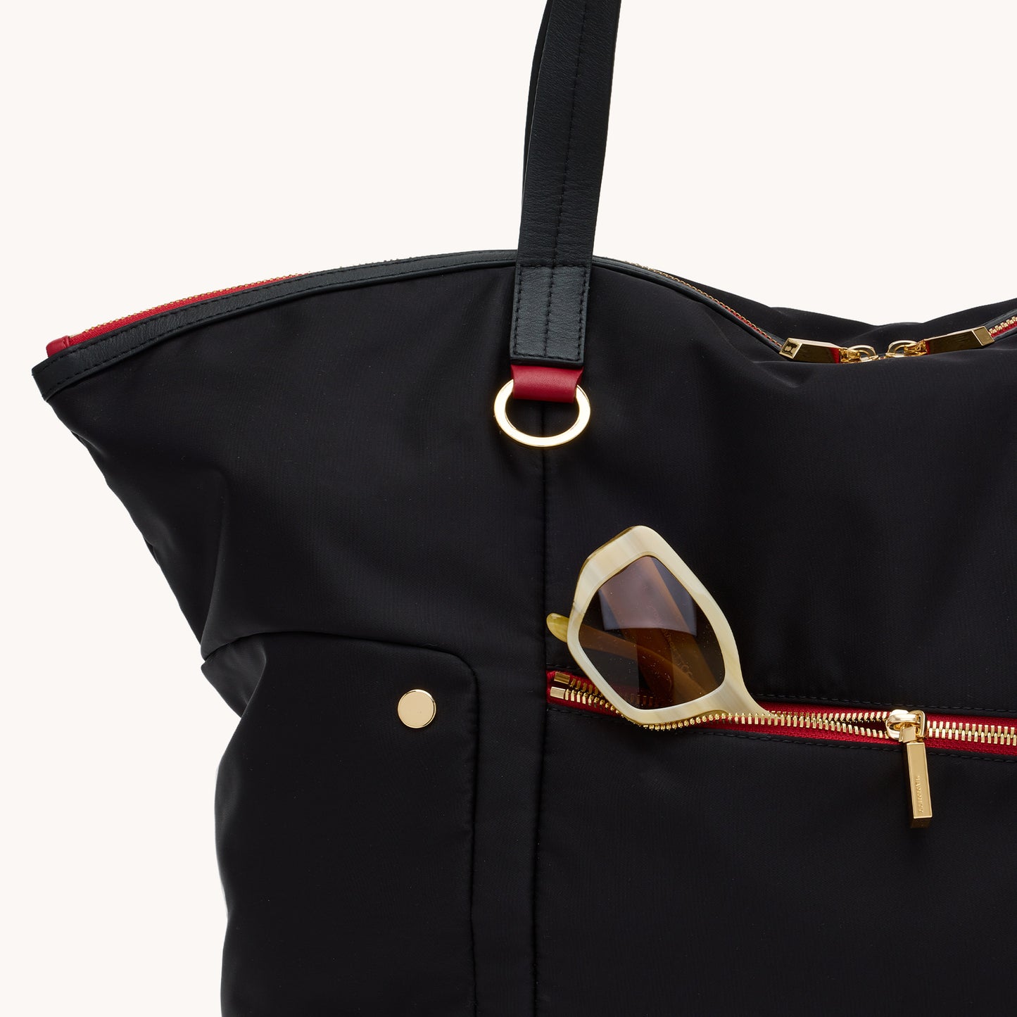 Zoe-Tote-Black-Nylon-G-Red-Zip-Front-View-Detail
