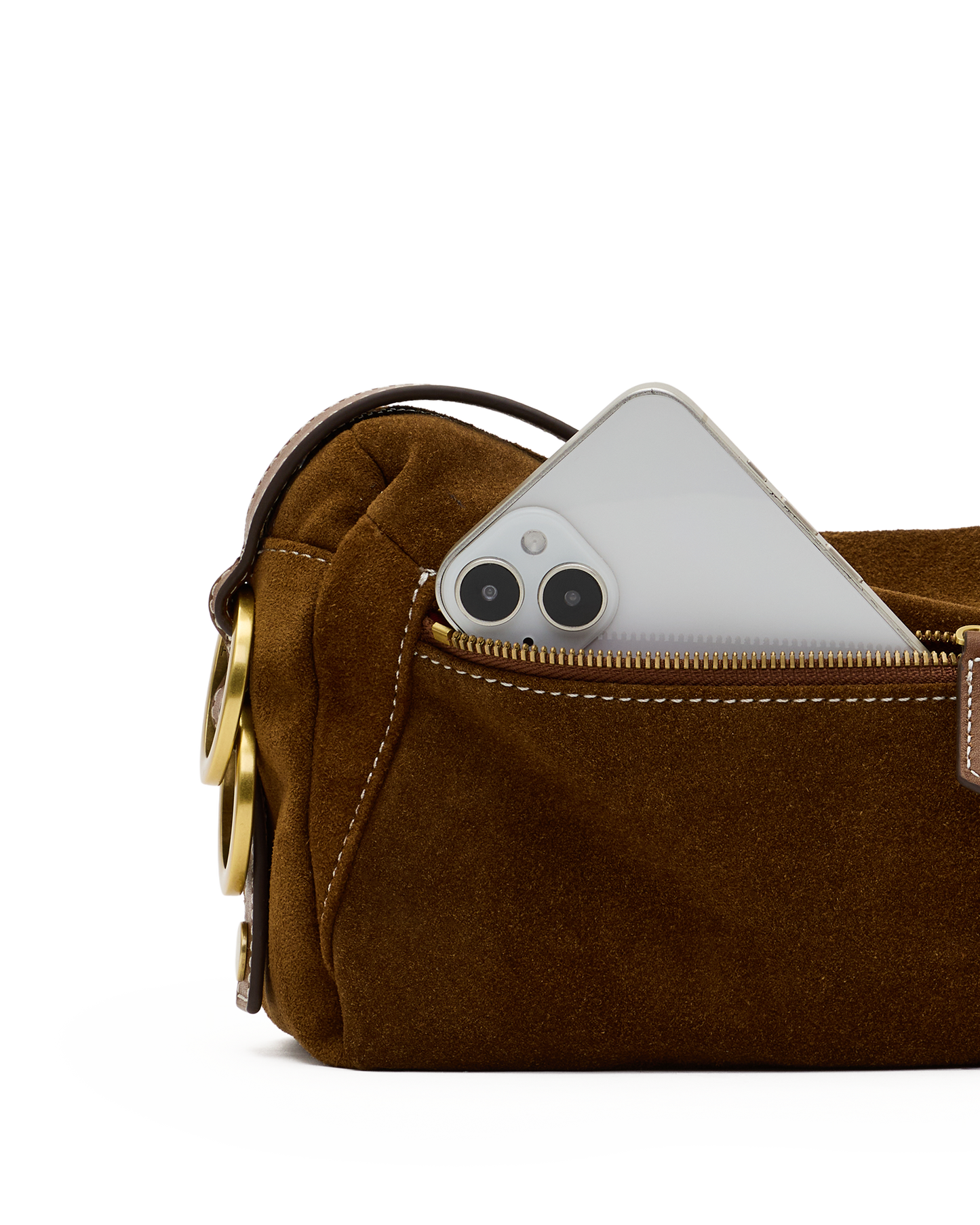 A close-up of a brown suede pouch or small bag with a gold-tone zipper, shown with a silver smartphone partially tucked into the pocket against a white background.