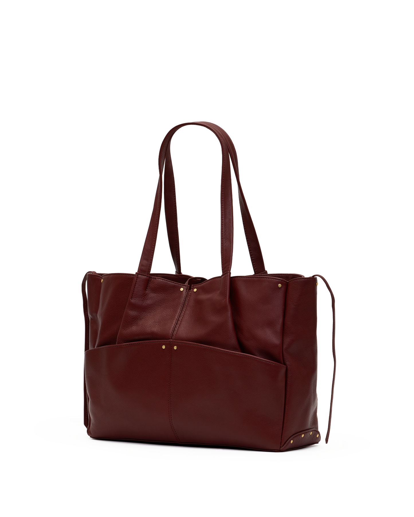 A dark burgundy leather tote bag with dual shoulder straps, a front slip pocket, and small gold-tone hardware, shown on a plain white background.