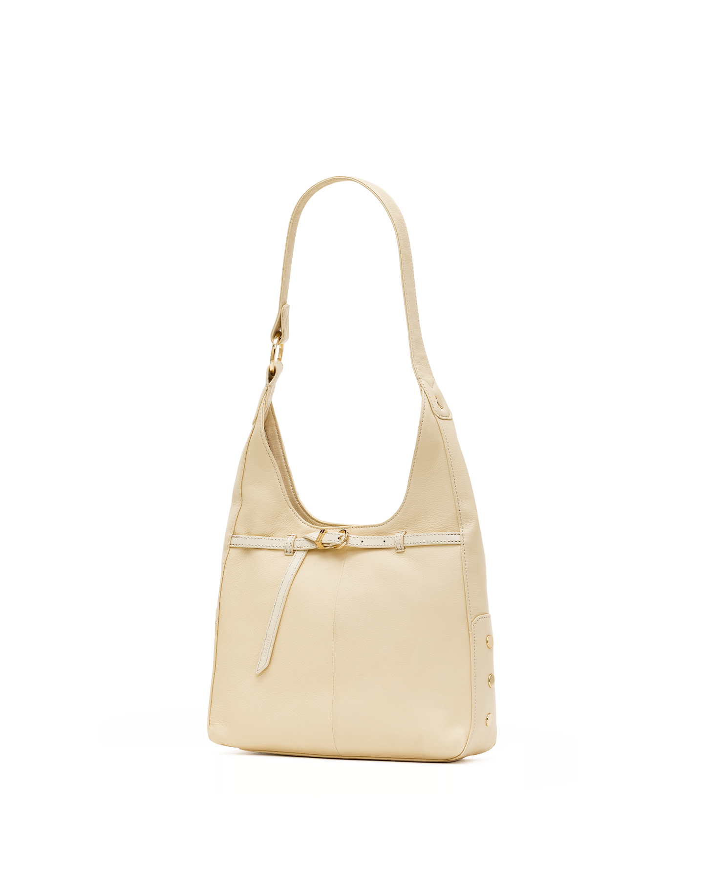 A light beige leather shoulder bag with a single strap, a front strap detail, and gold-tone hardware, shown against a plain white background.