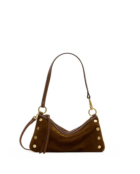 A brown suede crescent-shaped shoulder bag with gold-tone hardware and decorative gold studs.