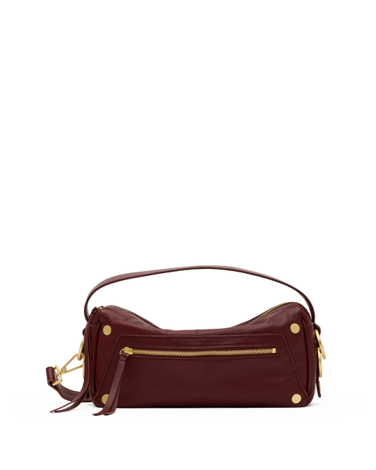 A burgundy leather shoulder bag with gold-tone hardware, a top handle, and a front zippered pocket, shown against a plain white background.