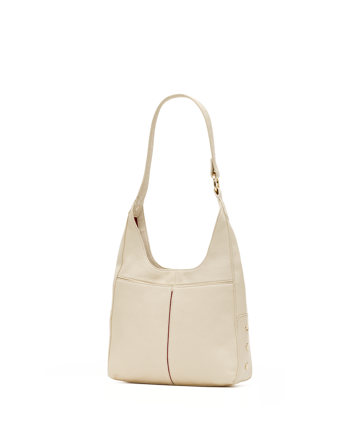 A light beige leather shoulder bag with a single strap and gold-tone hardware, shown against a plain white background.