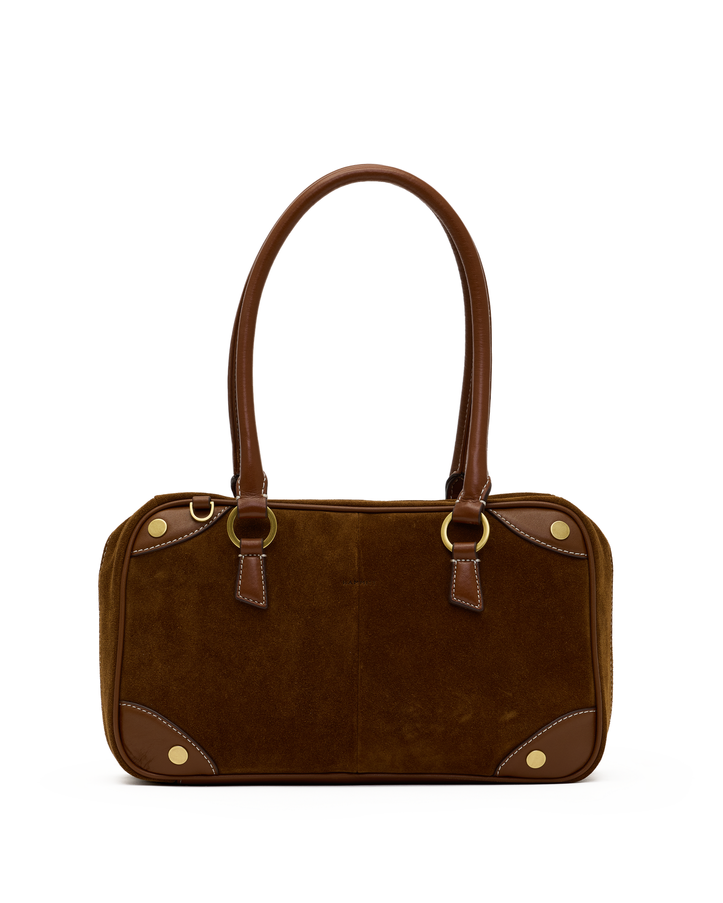 A brown suede and leather handbag with gold-tone hardware, featuring dual top handles, a structured rectangular body, and decorative brass studs on a plain white background.