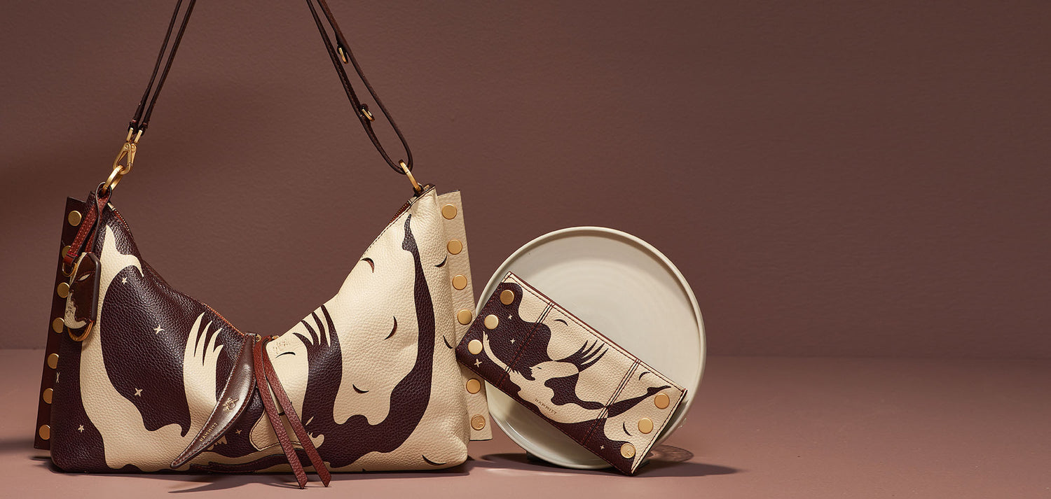 Celestial Dawn collection on brown background. Featured produtcs 110 NORTH | CELESTIAL DAWN/BRUSHED GOLD and MR. G | CELESTIAL DAWN/BRUSHED GOLD.