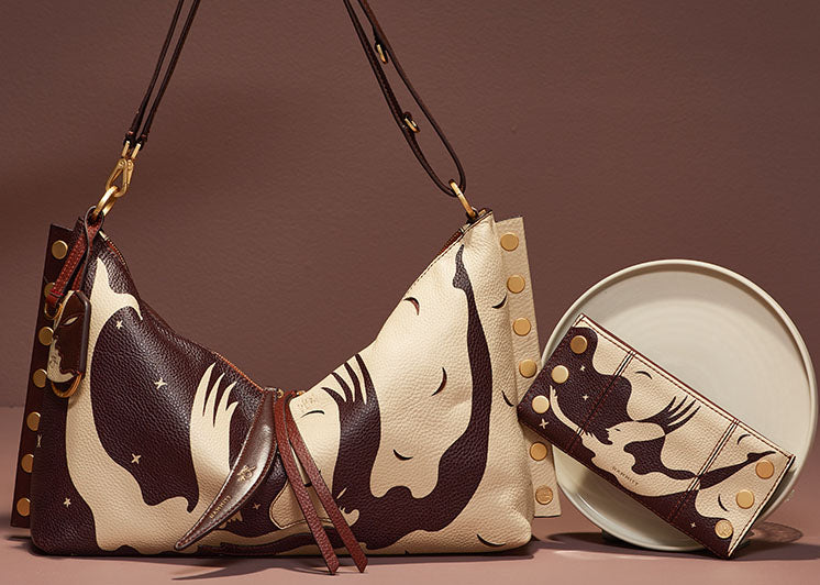 Celestial Dawn collection on brown background. Featured produtcs 110 NORTH | CELESTIAL DAWN/BRUSHED GOLD and MR. G | CELESTIAL DAWN/BRUSHED GOLD.