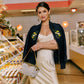 Daniel-Crossbody-Clutch-Sml-Meadow-Weave-G-Campaign-Model-View-1
