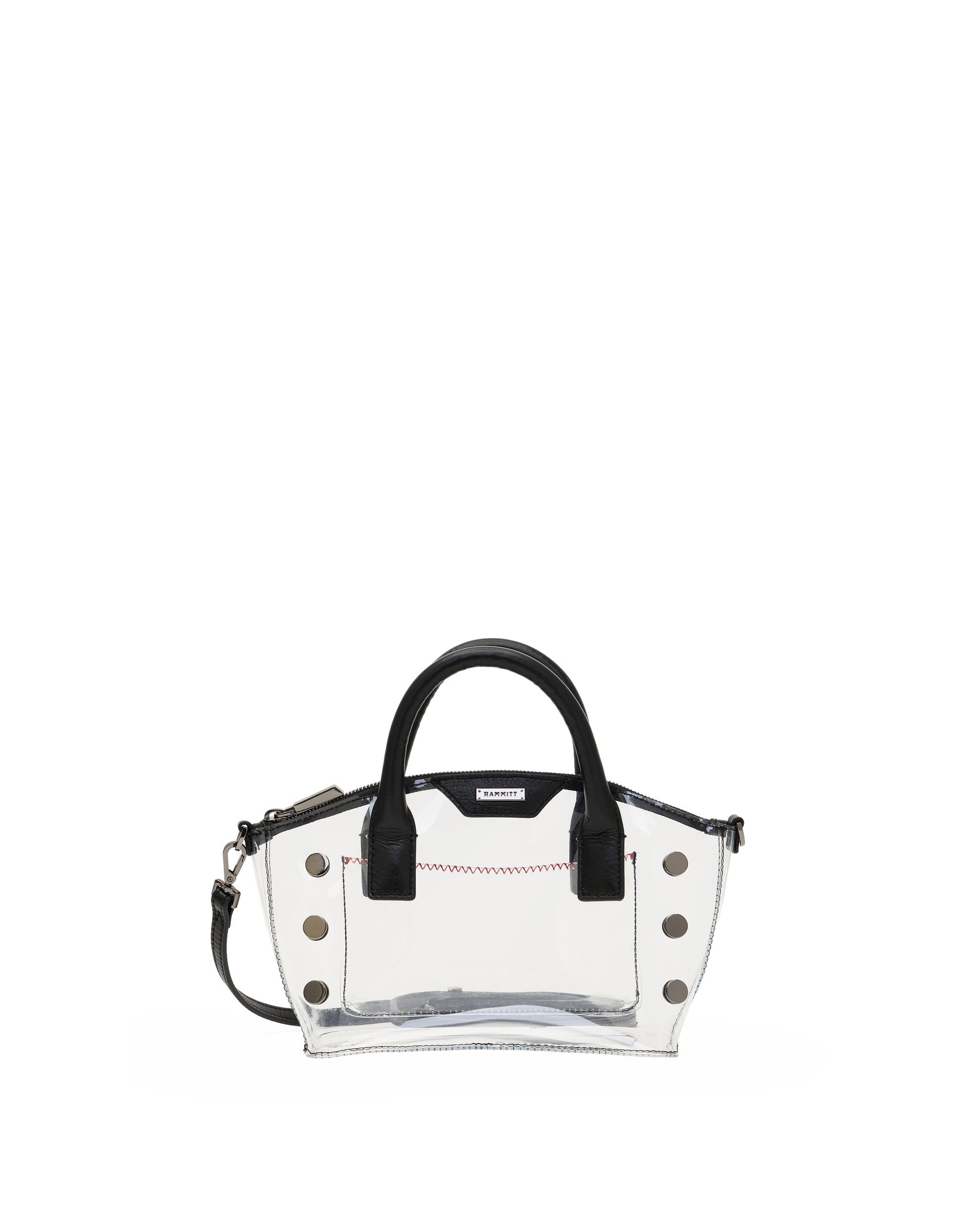 A clear transparent handbag with black leather handles and trim, silver-tone studs, and a small red stitched detail on the front.