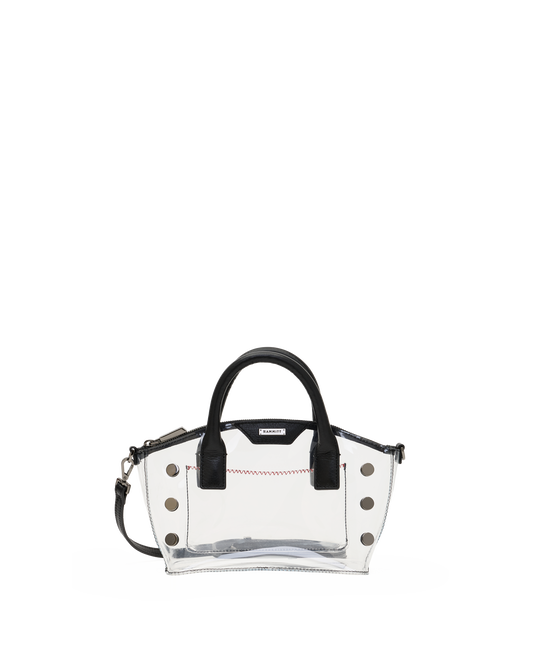 A clear transparent handbag with black leather handles and trim, silver-tone studs, and a small red stitched detail on the front.