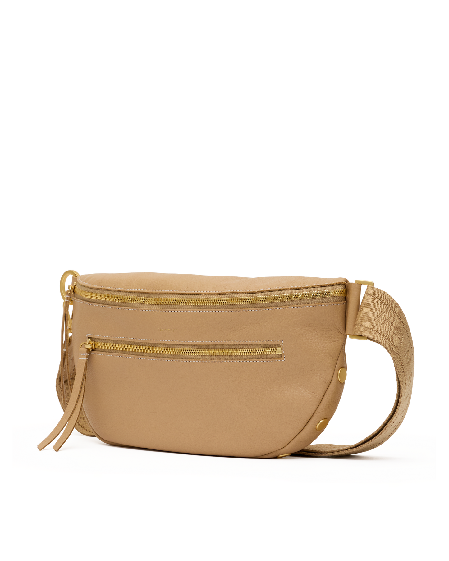 A beige leather belt bag with gold-tone zippers and hardware, featuring a front zip pocket and a matching woven shoulder strap, shown against a plain white background.