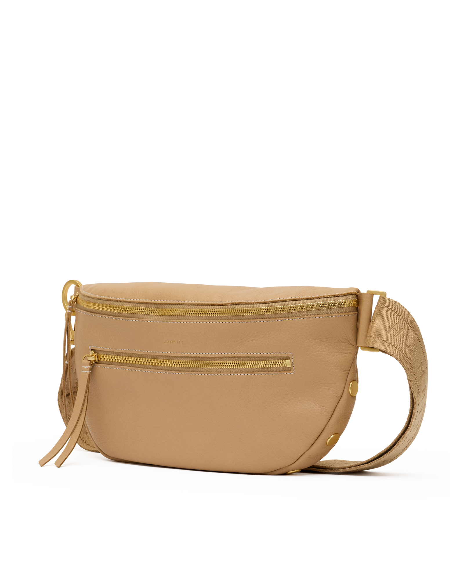A beige leather belt bag with gold-tone zippers and hardware, featuring a front zip pocket and a matching woven shoulder strap, shown against a plain white background.