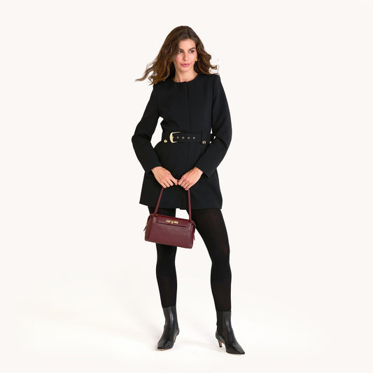 Model height is 5'9.5''