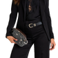A model wearing a black blazer, black lace top, and black trousers holds a black quilted clutch with brown leather trim and gold-tone hardware.
