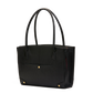 A black leather tote bag with double top handles, a front slip pocket with a gold button, and gold-tone corner hardware, shown on a plain white background.