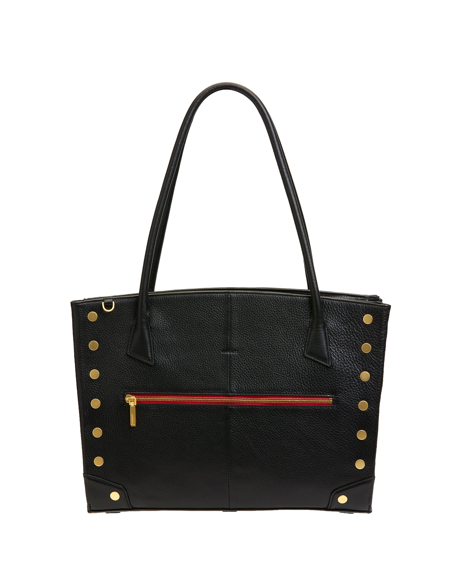 A black pebbled leather tote bag with gold-tone rivets and corner protectors, featuring dual top handles and a horizontal red zippered pocket on the front.