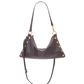 A dark brown leather shoulder bag with gold-tone hardware and gold stud accents, shown against a plain white background.