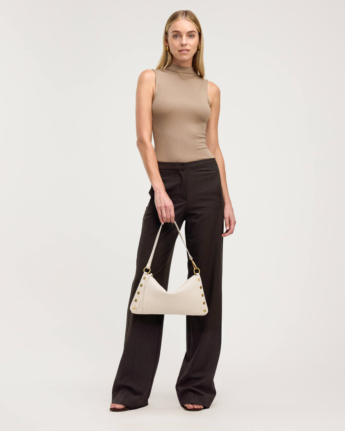 Model height is 5'10''