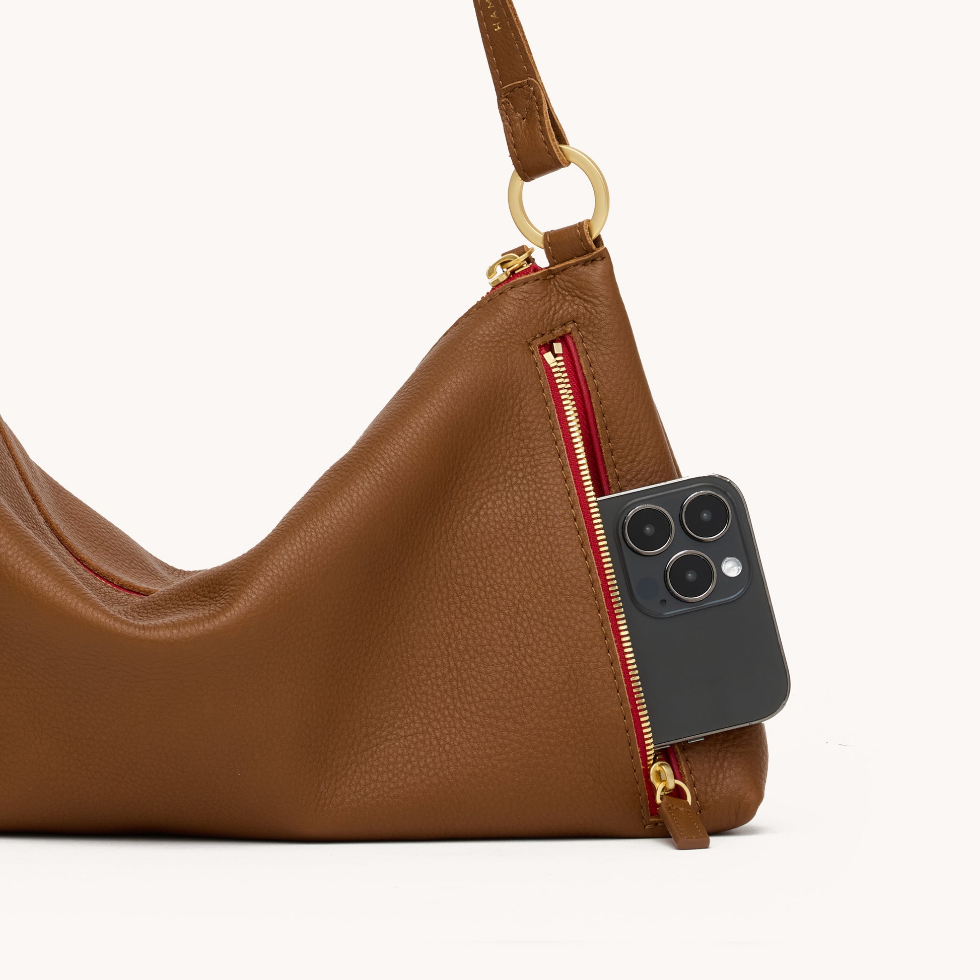 Kyle-Med-Mahogany-Pebble-BG-Red-Zip-Back-Detail-View