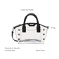 A clear acrylic handbag with black leather handles and trim.