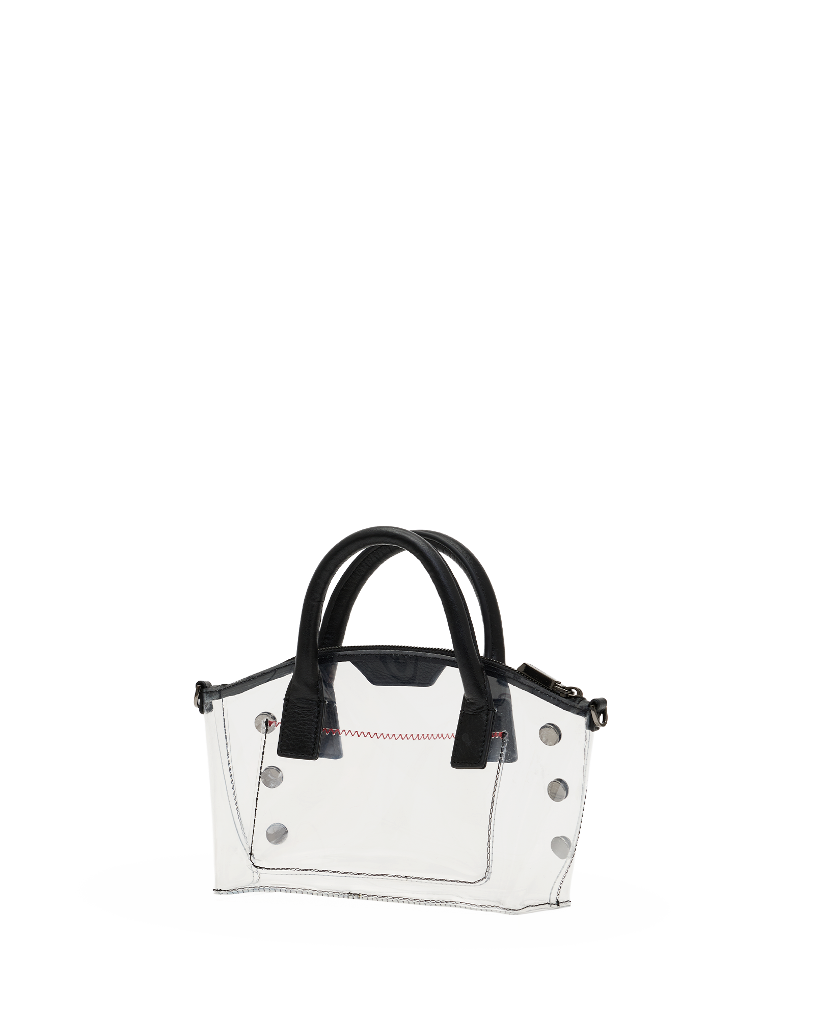 A clear transparent tote bag with black double top handles, black trim, and silver-tone metal studs, shown against a plain white background.