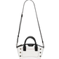 A clear vinyl handbag with black leather handles, a black shoulder strap, and silver-tone studs, shown against a plain white background.