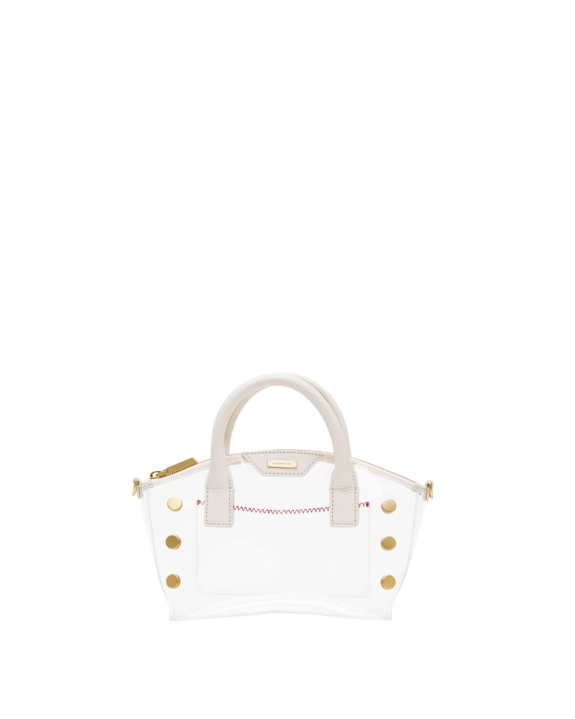 A structured white leather handbag with gold-tone hardware, featuring dual top handles, decorative gold studs, and a thin red stitched detail across the front, set against a plain white background.