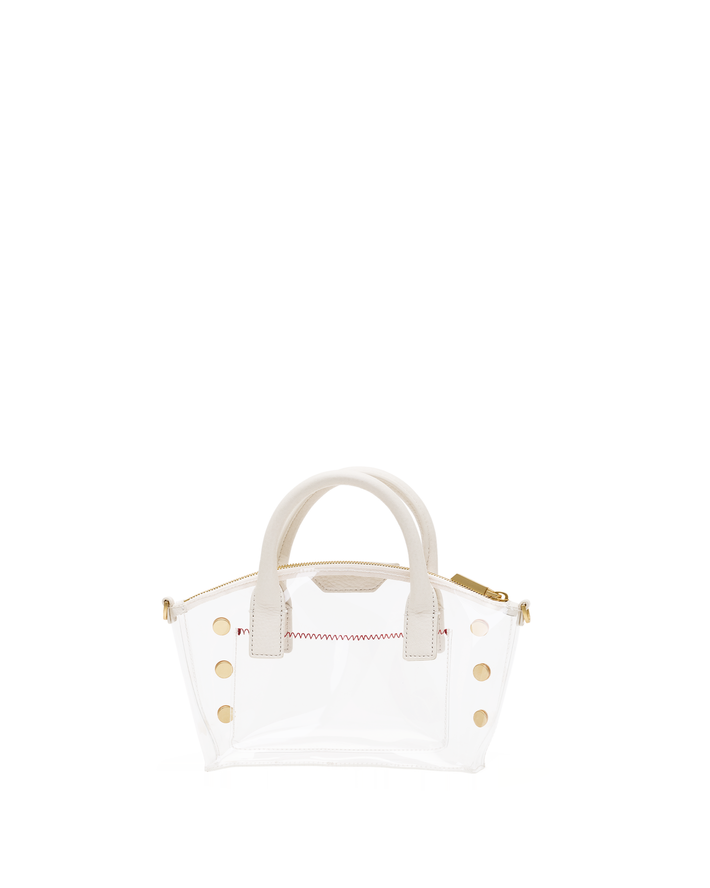 A clear vinyl handbag with cream-colored handles and trim, accented by gold-tone studs and a red stitched detail on the front.