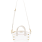 A clear vinyl handbag with white leather trim, gold-tone hardware, a top handle, and a long adjustable shoulder strap.