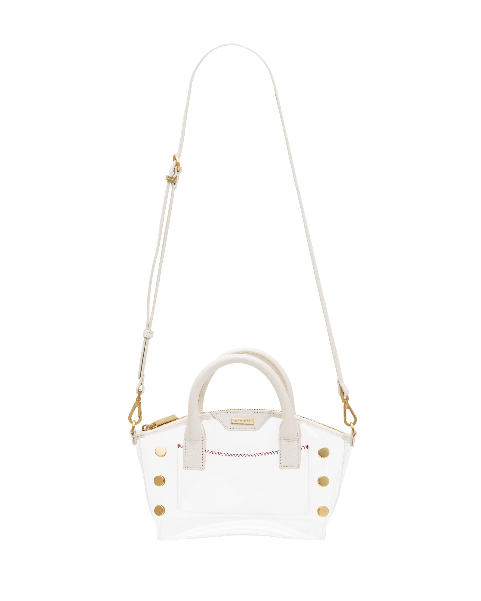 A clear vinyl handbag with white leather trim, gold-tone hardware, a top handle, and a long adjustable shoulder strap.