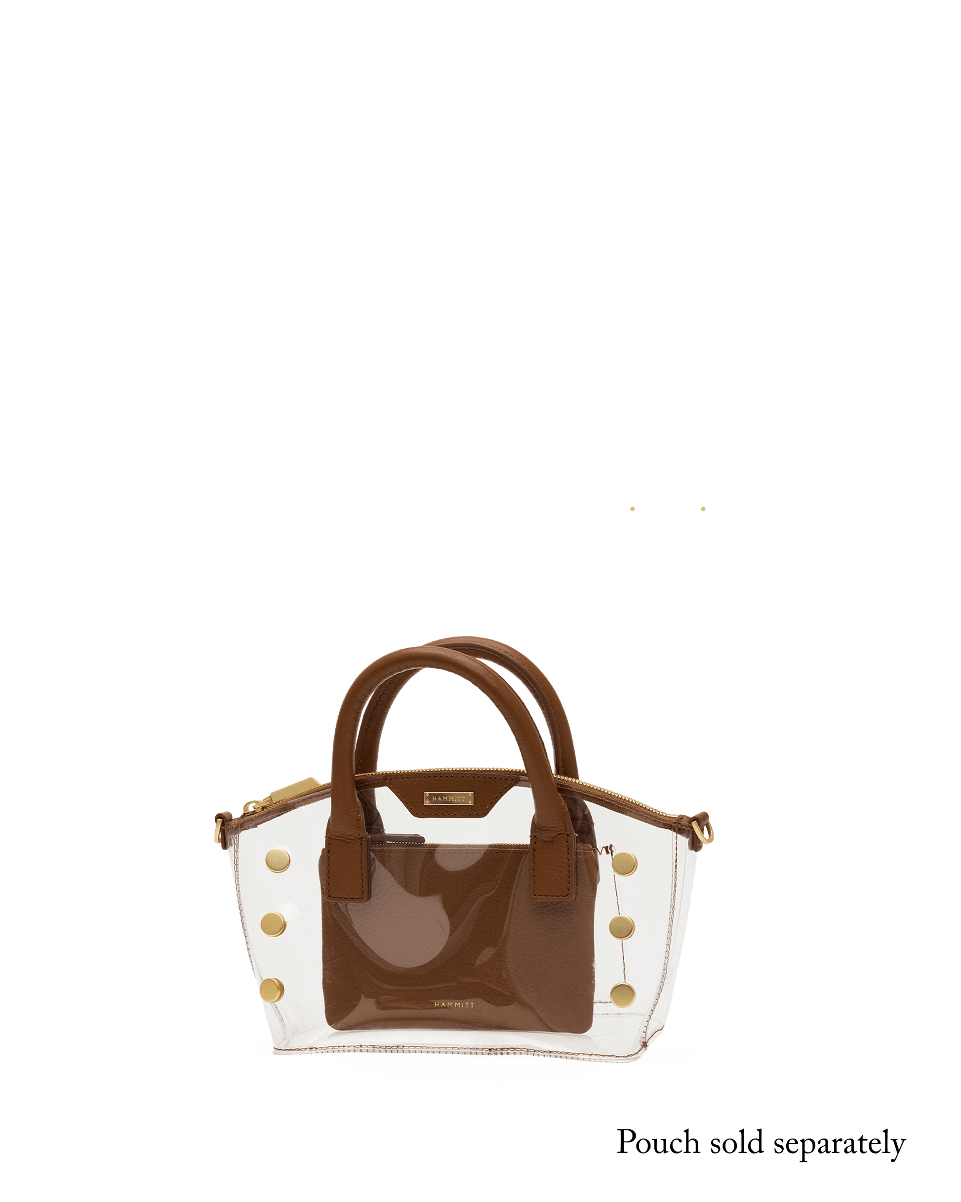 A structured handbag with a glossy brown front panel and handles, combined with a clear transparent side panel decorated with gold-tone studs.