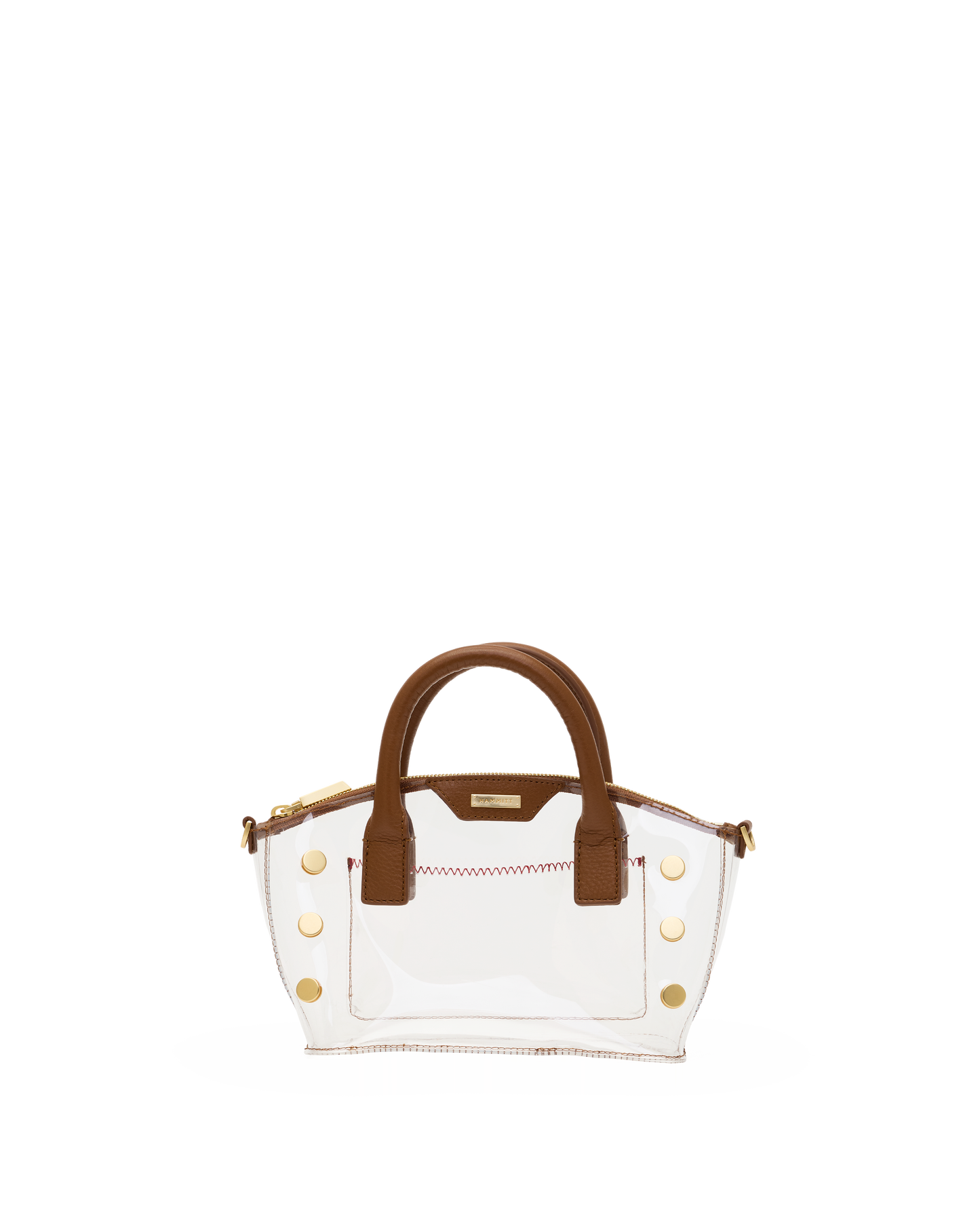 A clear vinyl handbag with brown leather handles and trim, accented by gold-tone hardware and a zippered top.