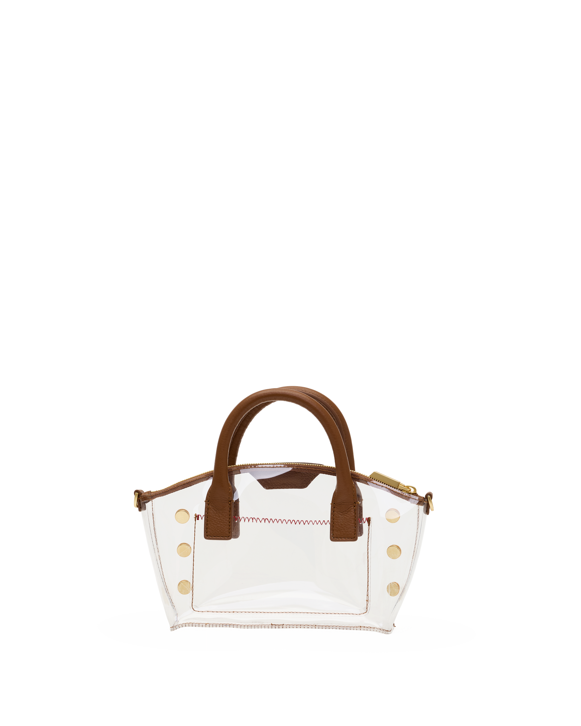 A clear acrylic handbag with brown faux-leather handles and trim, accented by gold-tone studs .
