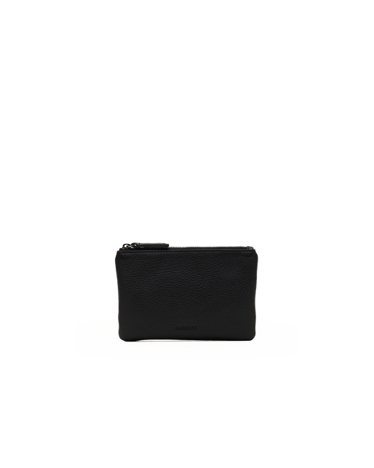 A small black leather zip pouch with a pebbled texture, shown against a plain white background.