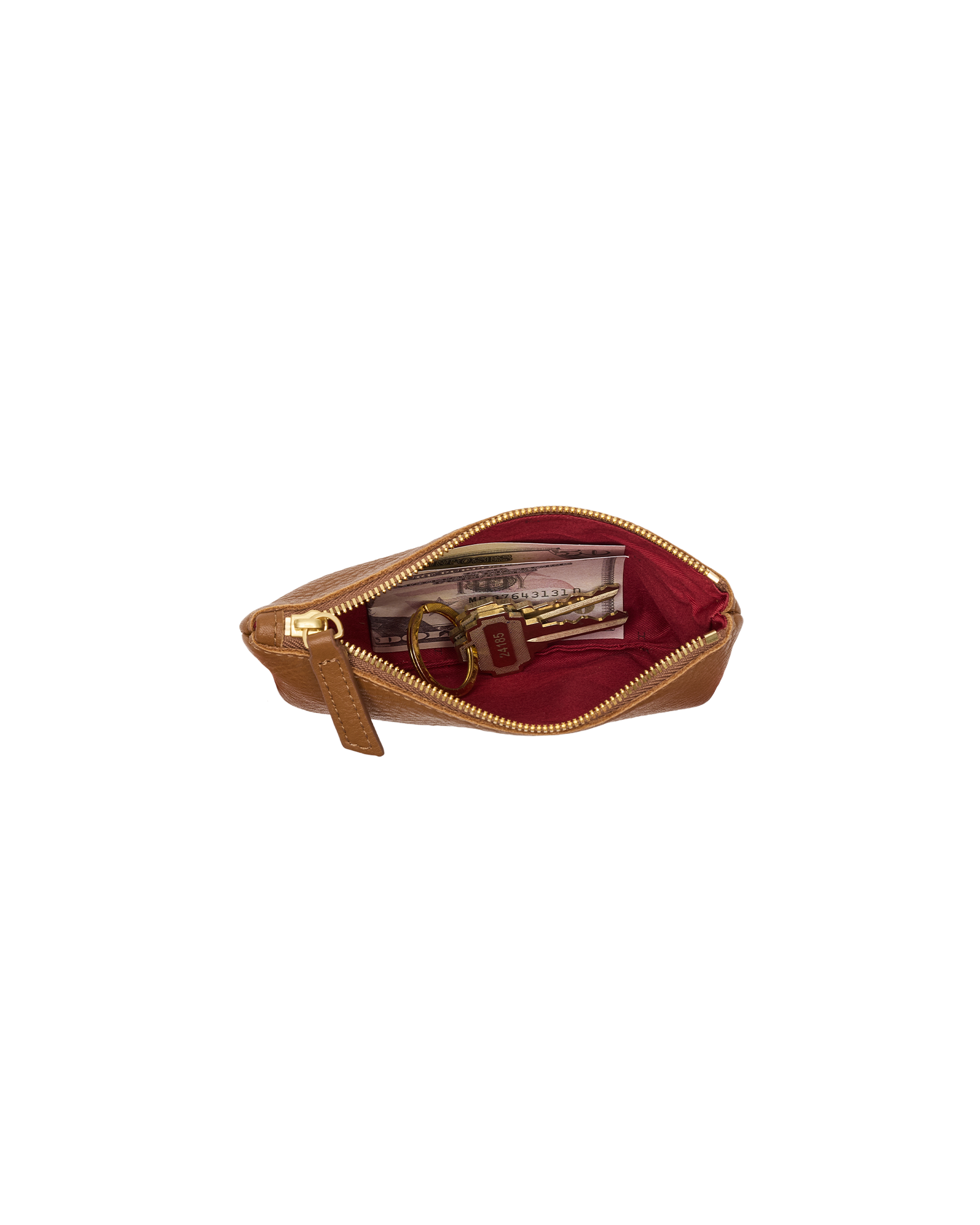 A tan leather zippered pouch shown open, revealing a deep burgundy red interior lining and gold-tone hardware, with a small keychain and cardholder inside.