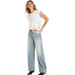 A woman modeling a white sleeveless top, light-wash wide-leg jeans, a gold belt, and black pointed-toe heels, while carrying a small white handbag with a gold chain strap.