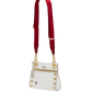 White handbag with gold accents and a red strap on a white background
