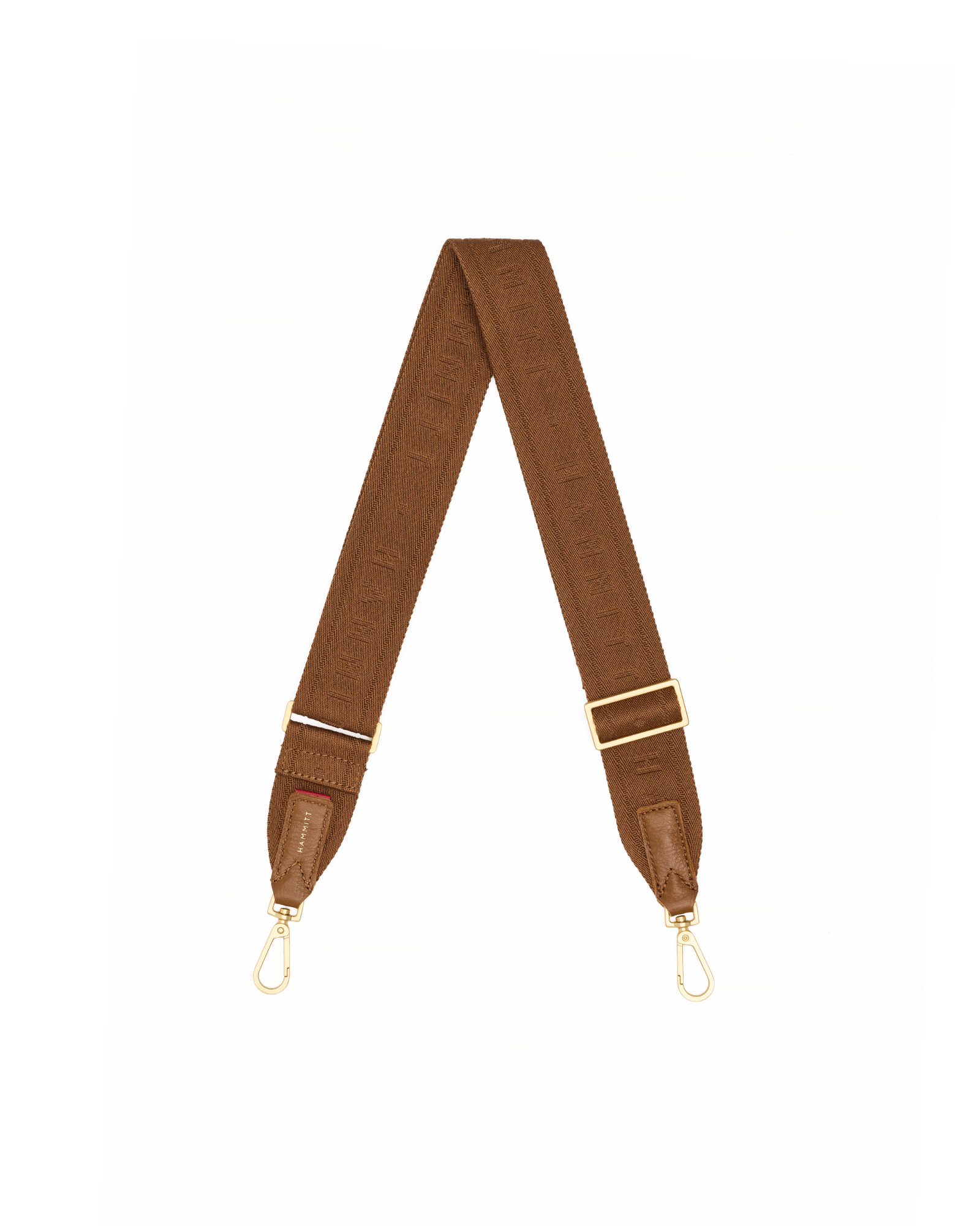 A brown fabric shoulder strap with gold-tone metal hardware, including swivel clips and adjustment sliders, laid out in a V-shape.