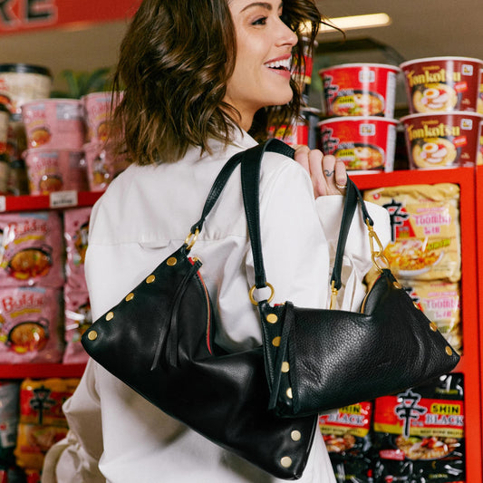 Kyle-Med-Black-BG-Red-Zip-lifestyle-View