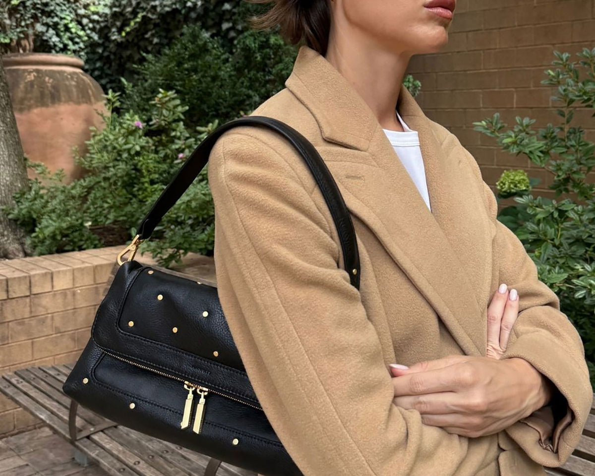 Beverly Starlight on woman with camel peacoat