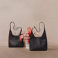 Flower Still Life with Tim Black Brushed Gold Red Zip and Black Gunmetal