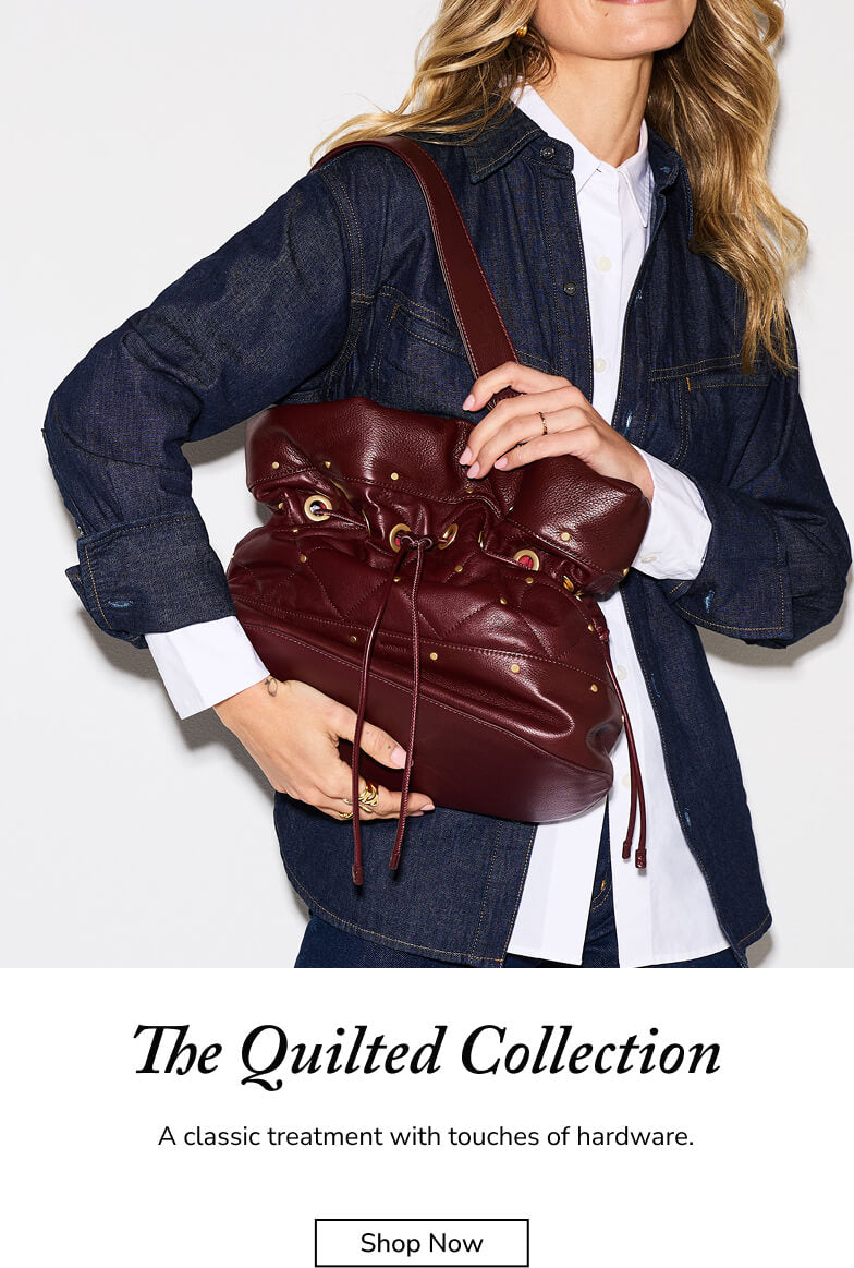 A woman wearing a dark denim jacket and white shirt carries a burgundy quilted leather shoulder bag with gold-tone hardware and drawstring details. Text at the bottom reads 'The Quilted Collection' with a 'Shop Now' button below.
