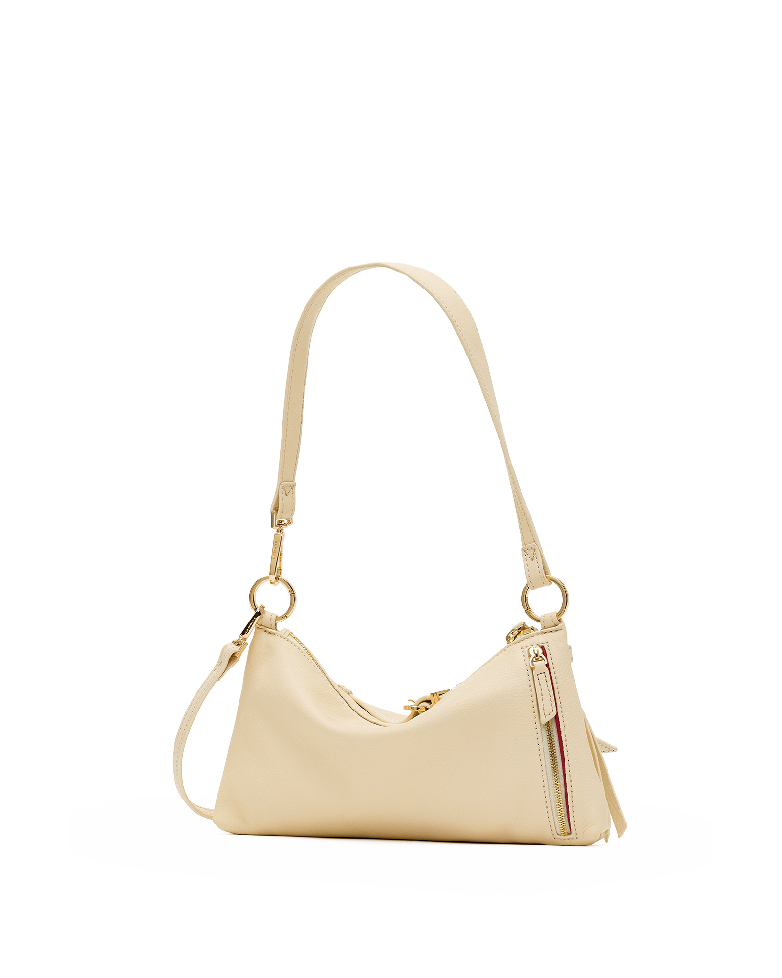 A light beige leather shoulder bag with a curved top, gold-tone hardware, and a matching shoulder strap, shown against a plain white background.